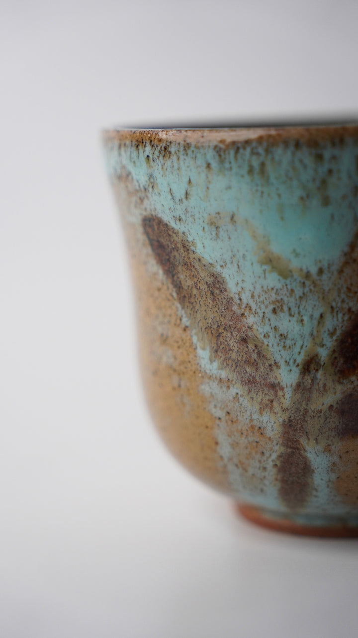 Indus Copper stoneware mug featuring a rich metallic earth-tone glaze